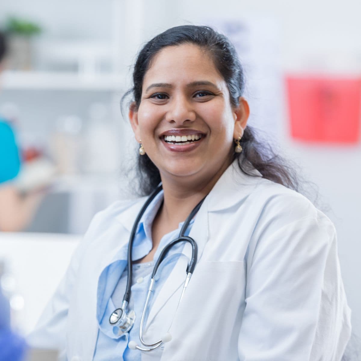 MPhysician in labcoat female