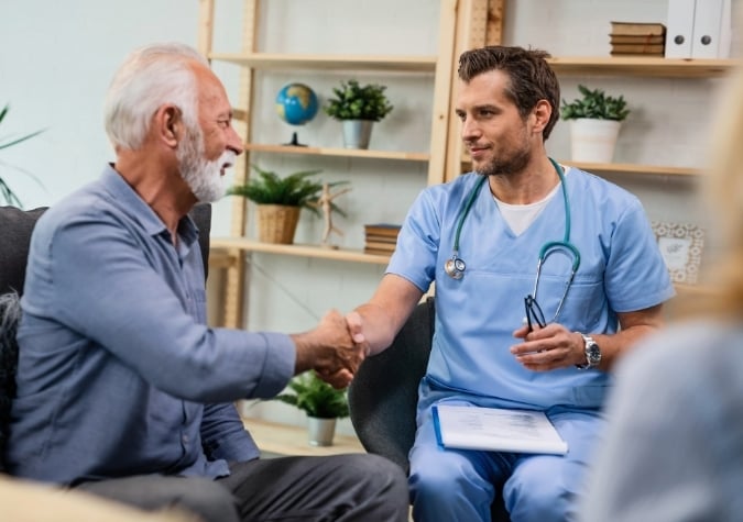 anasthetist with patient pre-surgery
